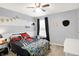 bedroom decorated with baseball and car themes with soft carpet and neutral gray walls at 10306 Mcclain Dr, Brownsburg, IN 46112