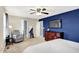 Spacious bedroom complete with a walk-in closet, soft carpet, and a cozy seating area at 10306 Mcclain Dr, Brownsburg, IN 46112