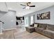 Open living space with kitchen and dining areas, natural light, and hardwood floors at 10306 Mcclain Dr, Brownsburg, IN 46112