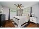 Main bedroom featuring a comfortable bed, neutral decor, and natural lighting at 11802 Prairie Pl, Carmel, IN 46033