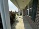 Covered porch with white columns and brick accents, offering a cozy outdoor space at 1218 Bedford Dr, Avon, IN 46123