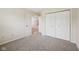 Clean bedroom with plush carpet, closet, and a neutral color palette at 12207 Blue Sky Dr, Fishers, IN 46037