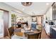 Dining area adjacent to kitchen featuring wood table and chairs with an open concept design at 1295 Maclaren Ct, Franklin, IN 46131