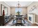Formal dining room with modern lighting, large window, and stylish decor and wine fridge at 1295 Maclaren Ct, Franklin, IN 46131