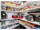 Walk-in pantry with lots of shelving storage for food items, drinks, and countertop appliances at 1295 Maclaren Ct, Franklin, IN 46131