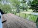 Exterior balcony with dark railing and a view of the surrounding greenery at 1445 S 750 W, Shelbyville, IN 46176
