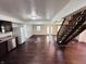 Finished basement with new floors, stainless steel appliances and an open staircase at 1445 S 750 W, Shelbyville, IN 46176