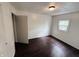 Bedroom with new hardwood flooring, one window, and a neutral color palette at 1445 S 750 W, Shelbyville, IN 46176