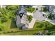 Home featuring a large driveway, fenced yard, and well-maintained landscaping at 15047 Glenmoor Cir, Carmel, IN 46033