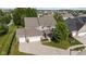 Beautiful home boasts a spacious layout, three-car garage, and lush landscaping at 15047 Glenmoor Cir, Carmel, IN 46033