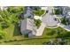 Large home with a sprawling lawn, fenced yard, and mature landscaping at 15047 Glenmoor Cir, Carmel, IN 46033