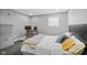 This bedroom features a bed, carpeted floors, a window, and a desk at 15047 Glenmoor Cir, Carmel, IN 46033