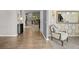 Bright living room featuring sleek floors, elegant decor, and comfortable seating at 15047 Glenmoor Cir, Carmel, IN 46033