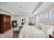 This expansive main bedroom is complete with a sitting area, tray ceiling and lots of light at 15047 Glenmoor Cir, Carmel, IN 46033