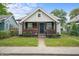 Charming home with well-maintained lawn and inviting front porch at 1529 E Tabor St, Indianapolis, IN 46203