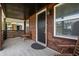 Inviting covered porch with wood accents and seating area at 1529 E Tabor St, Indianapolis, IN 46203