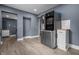 Open kitchen view featuring a stainless steel refrigerator at 1529 E Tabor St, Indianapolis, IN 46203