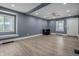 Bright and airy living room with modern flooring and ample natural light at 1529 E Tabor St, Indianapolis, IN 46203