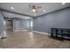 Open-concept living room featuring modern flooring and ample natural light at 1529 E Tabor St, Indianapolis, IN 46203