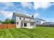 Large backyard with a well-maintained lawn and privacy fence, perfect for outdoor enjoyment at 16138 Palmyra Green, Westfield, IN 46074
