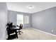 Neutral bedroom with a desk and chair, offering a quiet and functional space at 16138 Palmyra Green, Westfield, IN 46074
