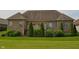 Spacious backyard with mature trees and lush green grass that backs up to the home at 16550 Gleneagles Ct, Noblesville, IN 46060