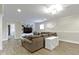 Basement featuring a sectional sofa, a built-in unit with a TV, and an accent wall-mounted US map at 16550 Gleneagles Ct, Noblesville, IN 46060