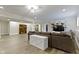 Spacious basement area featuring recessed lighting, a large sectional, and a built-in entertainment center at 16550 Gleneagles Ct, Noblesville, IN 46060