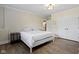 Bright bedroom featuring neutral decor, wood floors, double closets, and a comfortable atmosphere at 16550 Gleneagles Ct, Noblesville, IN 46060