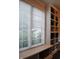 Bright walk-in closet area featuring window and custom shelving with basket storage at 16550 Gleneagles Ct, Noblesville, IN 46060