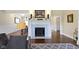 Close up of the fireplace featuring an intricate marble detail at 16550 Gleneagles Ct, Noblesville, IN 46060
