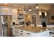 Spacious kitchen with stainless steel appliances and a large island at 16550 Gleneagles Ct, Noblesville, IN 46060