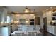 Spacious kitchen with granite countertops, white cabinets, and stainless steel appliances at 16550 Gleneagles Ct, Noblesville, IN 46060