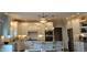 Bright kitchen featuring stainless steel appliances, granite counters, and ample cabinet space at 16550 Gleneagles Ct, Noblesville, IN 46060