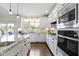 Bright kitchen with ample counter space and a view of the backyard at 16550 Gleneagles Ct, Noblesville, IN 46060