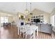 Open layout seamlessly connects the living room, dining, and kitchen areas at 16550 Gleneagles Ct, Noblesville, IN 46060