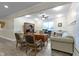 Bright home office with natural light, ceiling fan, a desk, and seating for a productive workspace at 16550 Gleneagles Ct, Noblesville, IN 46060