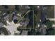 An aerial view with property lines outlines the home and its surroundings, showing landscaping and the location within the neighborhood at 1819 Quiet Haven Cir, Indianapolis, IN 46229