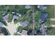 An aerial outline of the home lot, detailing property lines, surrounding greenery, and nearby neighborhood features and streets at 1819 Quiet Haven Cir, Indianapolis, IN 46229