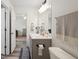 Clean bathroom with modern fixtures, towel bar, a vanity with a sink, and a toilet at 1819 Quiet Haven Cir, Indianapolis, IN 46229