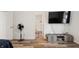 Comfortable bedroom with hardwood floors, and a view of the bathroom with a shower and toilet at 1819 Quiet Haven Cir, Indianapolis, IN 46229
