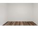 Bedroom with wood-look floors and neutral walls at 1819 Quiet Haven Cir, Indianapolis, IN 46229