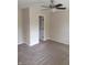 Bedroom featuring neutral carpet and ceiling fan with doorway at 18851 Wimbley Way, Noblesville, IN 46060