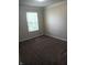 Neutral carpeted bedroom featuring a window at 18851 Wimbley Way, Noblesville, IN 46060
