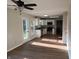 Bright and airy open concept kitchen and living room area with hardwood floors and natural light at 18851 Wimbley Way, Noblesville, IN 46060