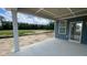 Covered patio offering stunning views of the expansive backyard, perfect for outdoor living and relaxation at 1919 Delp Ct, Avon, IN 46123
