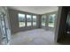 Sun-filled living room with multiple windows providing picturesque views of the surrounding landscape at 1919 Delp Ct, Avon, IN 46123