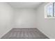 Bedroom featuring neutral carpeting, freshly painted walls, and ample natural light at 1948 Bloyd Ave, Indianapolis, IN 46218