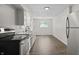 Modern kitchen featuring stainless steel appliances and ample counter space at 1948 Bloyd Ave, Indianapolis, IN 46218