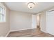 This bedroom features a window for natural light and two white doors at 2925 E 8Th St, Anderson, IN 46012